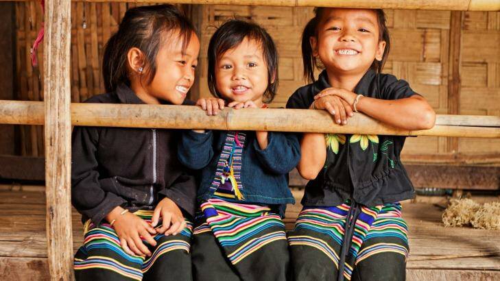 Locals in Laos. Photo: Bartosz Hadyniak