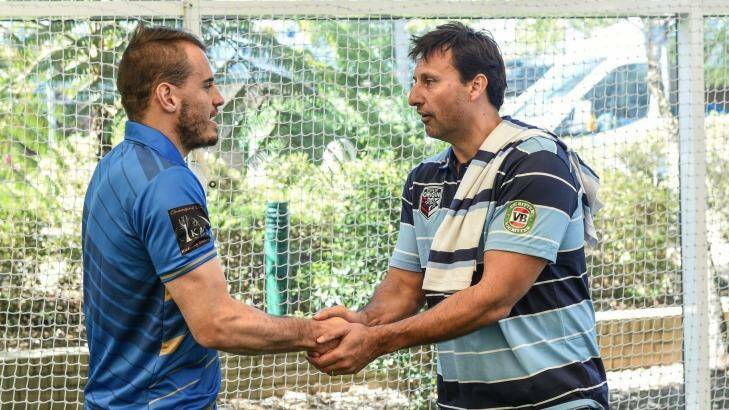 NSW Blues coach Laurie Daley (right) meets with City Origin player Josh Reynolds during the press call for the team. Photo: Brendan Esposito