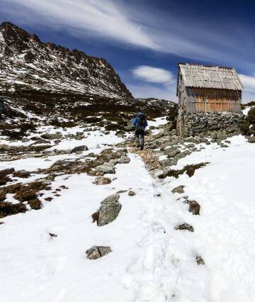 Through the snow to kitchen hut, on the flank of Cradle Mountain. Photo: iStock