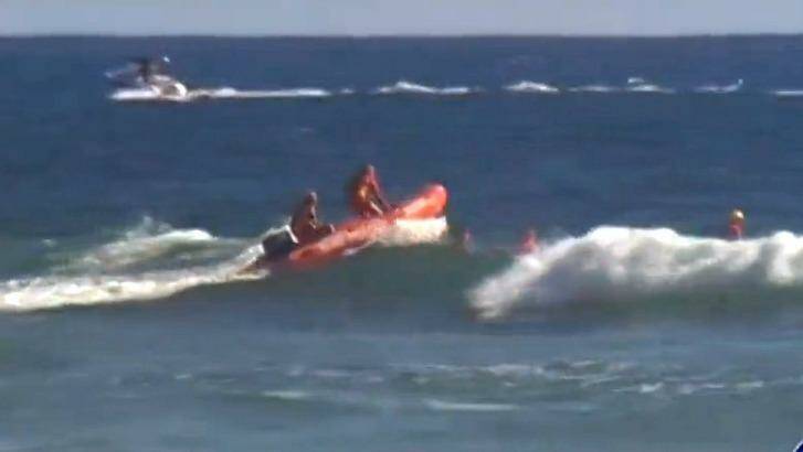 Crews search for the swimmer in the wake of his disappearance. Photo: Ten News