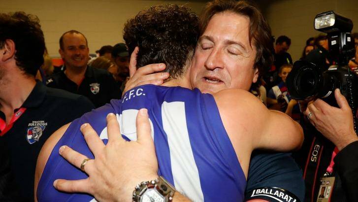 Bulldogs coach Luke Beveridge and Tom Liberatore celebrate after the club's preliminary final win. Photo: AFL Media/Getty Images