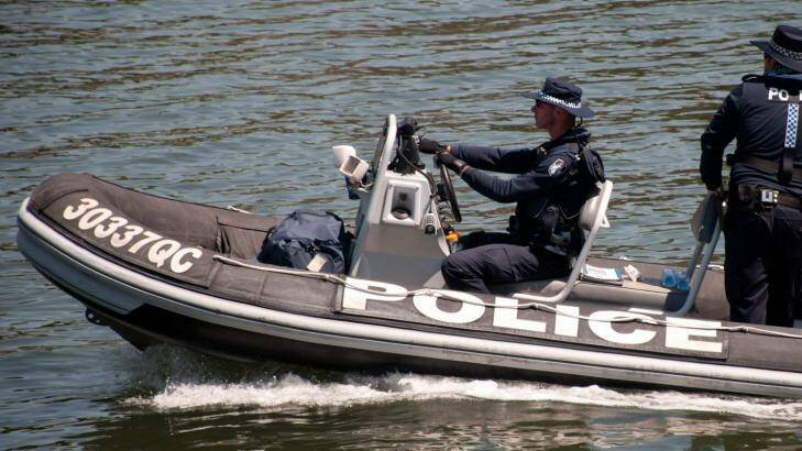 Water police are reportedly searching the Brisbane River. Photo: Robert Shakespeare
