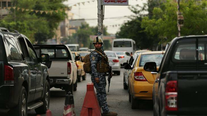 Daily insecurity: the Rahibat (Sisters) traffic checkpoint in Baghdad's Karrada district. Photo: Kate Geraghty