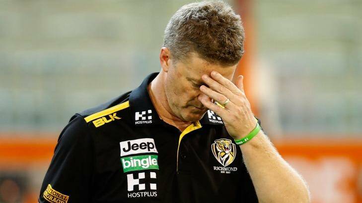 Damien Hardwick shields his eyes from the action on the field during the final quarter. Photo: AFL Media/Getty Images