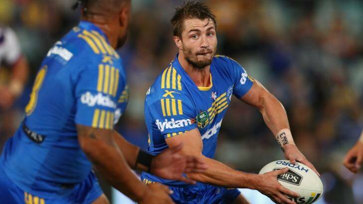 Returning Kieran Foran of the Eels passes during the loss to Storm on Monday night. Photo: Mark Kolbe
