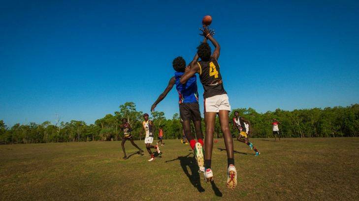 Players test out their skills at Tiwi College. Photo: Glenn Campbell