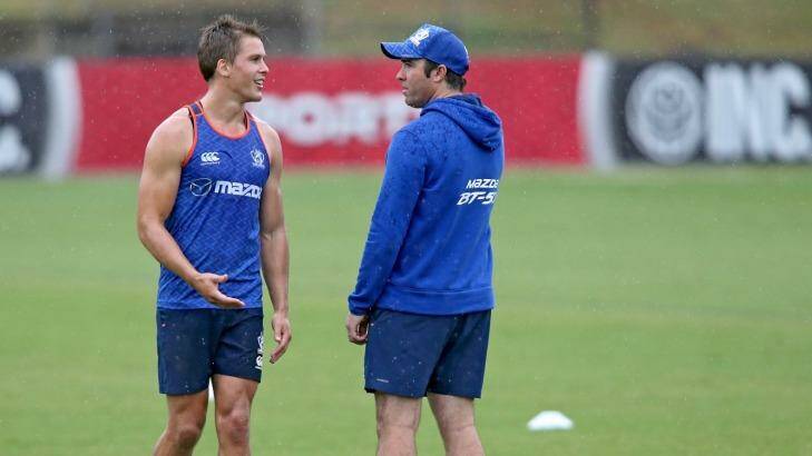 Preparation: Andrew Swallow with coach Brad Scott at Arden Street on Friday. Photo: Wayne Taylor