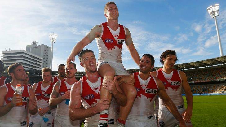 Dan Hannebery of the Swans is chaired off after what was his 150th game. Photo: AFL Media/Getty Images