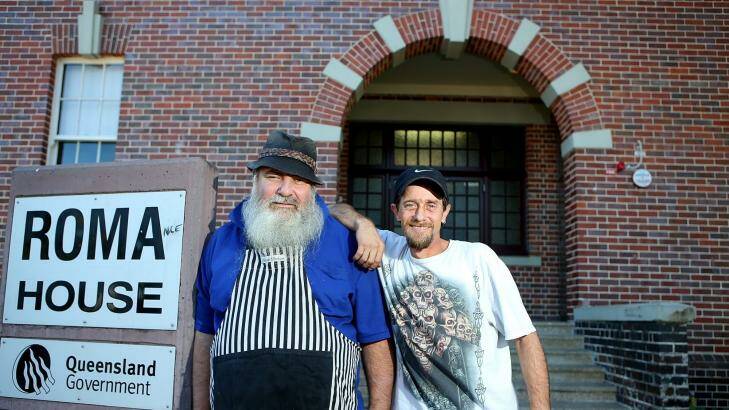 Wayne Duncan (L) and Michael Phillips pose for a photograph at Mission Australia's Winter Festival in Spring Hill. Photo: Chris Hyde
