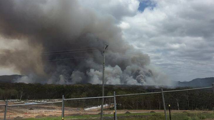 The Coolum bushfire continued to rage on Friday, as seen from the Peregian Springs water tower. Photo: Facebook / Kev Brock