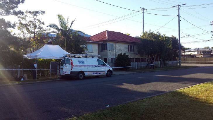 Police have descended on a Norman Park home following a woman's sudden death overnight.  Photo: Kristian Silva