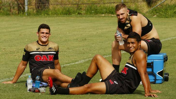 Three into two: Penrith young guns Nathan Cleary, Bryce Cartwright and Te Maire Martin relax after a training session. Photo: Daniel Munoz