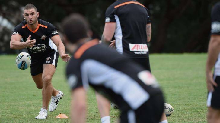 Locked in: Robbie Farah has now committed to playing out his NRL career at the Tigers. Photo: Nick Moir
