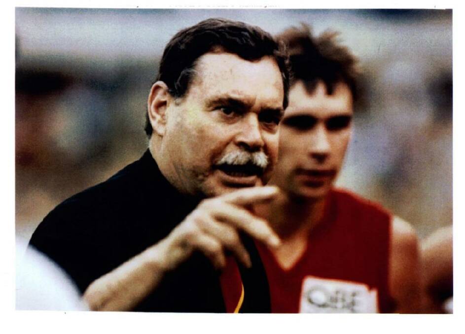 Ron Barassi when he was coach of the Sydney Swans, with team captain Paul Kelly. Photo: Stuart Hannagan