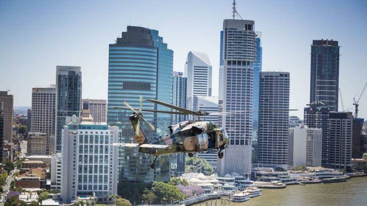 Blackhawk helicopters flying over Brisbane on exercise ahead of the G20. Photo: Glenn Hunt