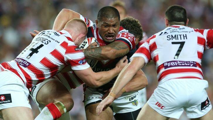 Frank Paul Nuuausala in action for the Sydney Roosters at the World Club Challenge. Photo: Anthony Johnson