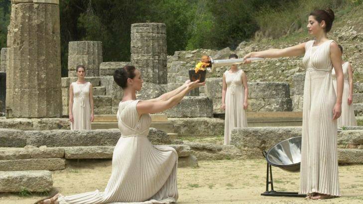 The ancient traditions were brought back to life at the opening ceremony of the Athens Olympics in 2000. The torch was lit at Olympia's temple of Hera, on the site where the original Olympics were born in 776 BC. Photo: Dimitri Messinis
