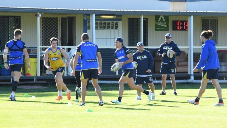 The show goes on: Parramatta Eels players train on Wednesday morning without their star winger. Photo: Peter Rae