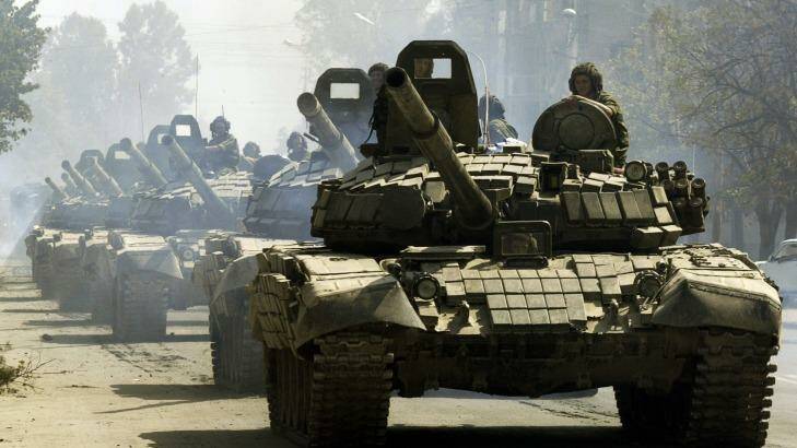 Russian tanks drive through Tskhinvali, the regional capital of Georgia's breakaway province of South Ossetia, moving to the Russian border in 2008. Photo: Dmitry Lovetsky