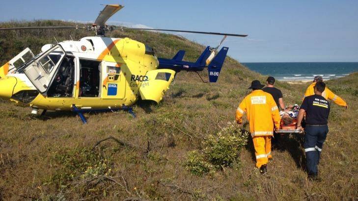 Crash victim airlifted from Fraser Island. Photo: RACQ CareFlight Rescue