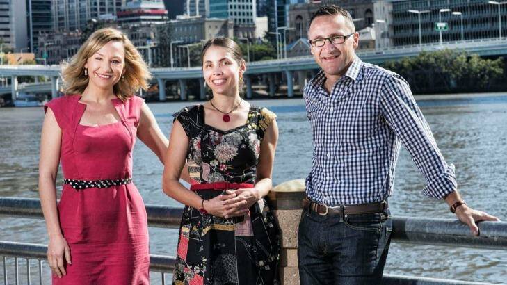 Queensland Greens leader Senator Richard di Natale with deputy leader Senator Larissa Waters and candidate Kirsten Lovejoy. They will call for an inner-city school to built within the new Queens Wharf resort behind them near George Street. Photo: supplied
