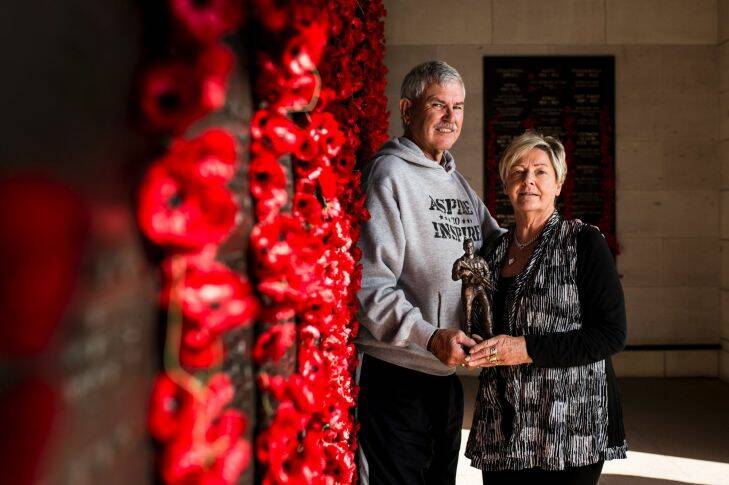 Doug and Kaye Baird with a statue of their son Cameron Baird, who was the 100th Victoria Cross recipient. It's being awarded to the best on ground at the Anzac Test.

Photo: Jamila Toderas Photo: Jamila Toderas