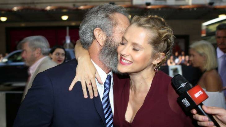 Gibson greets fellow actor Teresa Palmer at the premiere. Photo: James Alcock