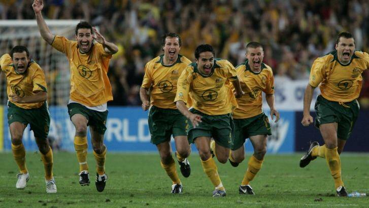 Socceroos players celebrate as John Aloisi scores the winner against Uruguay to qualify for the 2006 World Cup.  Photo: Tim Clayton