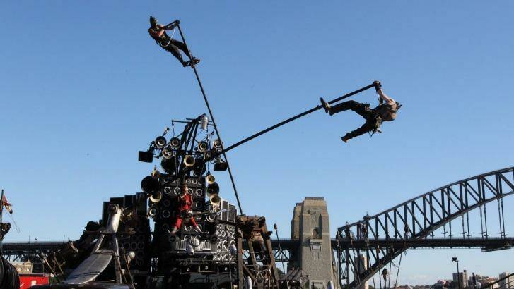Live stunts: Warriors ride poles during the <i>Mad Max: Fury Road</i> show at Sydney Opera House. Photo: Peter Rae