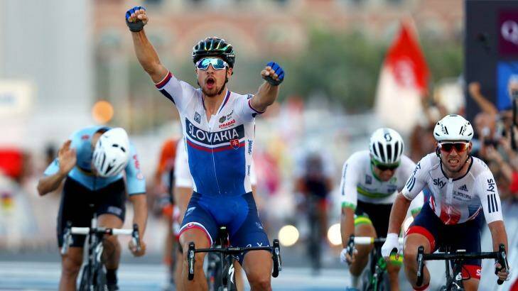 Peter Sagan wins back-to-back men's road race world titles, with Canberra's Michael Matthews, on his right, fourth. Photo: Bryn Lennon/Getty Images