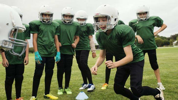 Next generation:  The NSW Gridiron under 8 team at training this week. Photo: Christopher Pearce