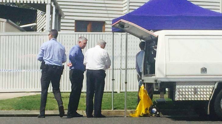 Police at the Kedron home where Sidney Playford was found dead in her bed by her mother. Photo: Kim Stephens