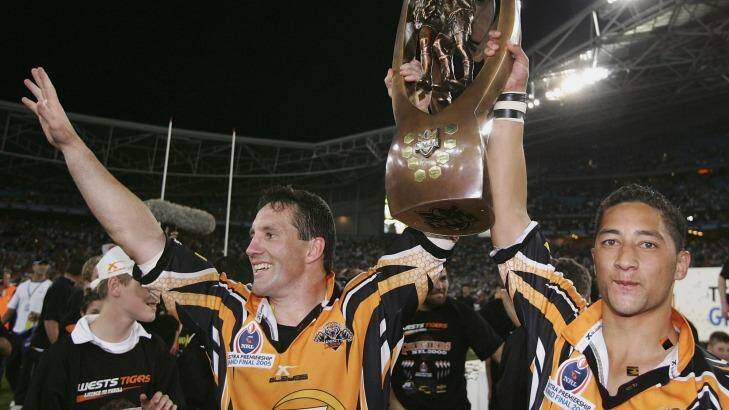Career highlight: Benji Marshall with teammate Mark O'Neill after the Wests Tigers won the NRL grand final against the North Queensland Cowboys in 2005. Photo: Cameron Spencer