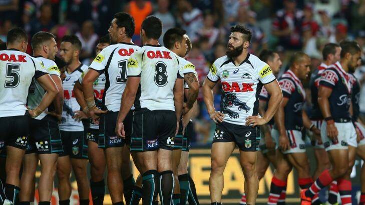 Dejection: Josh Mansour and his Penrith teammates on Monday night. Photo: Mark Kolbe