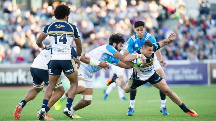 30 April 2017. Super Rugby Round 10: ACT Brumbies v Auckland Blues at GIO Stadium. Brumbies' flyhalf Wharenui Hawera was unimpressed after being thrown to the ground by Blues' No. 8 Akira Ioane. Photo: Sitthixay Ditthavong Photo: Sitthixay Ditthavong