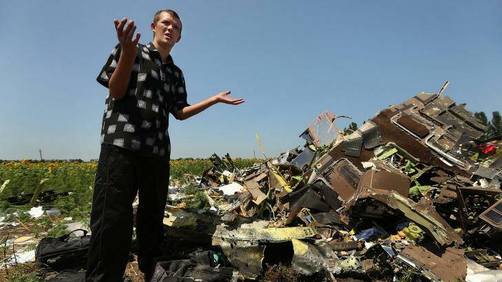 Pro-Russian rebel Eugene Lukovkin at the crash site. Photo: Kate Geraghty