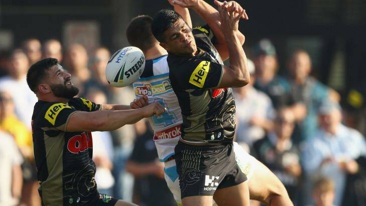 Wilting under pressure: Josh Mansour and Tyrone Peachey in action at Pepper Stadium on Sunday. Photo: Getty Images 