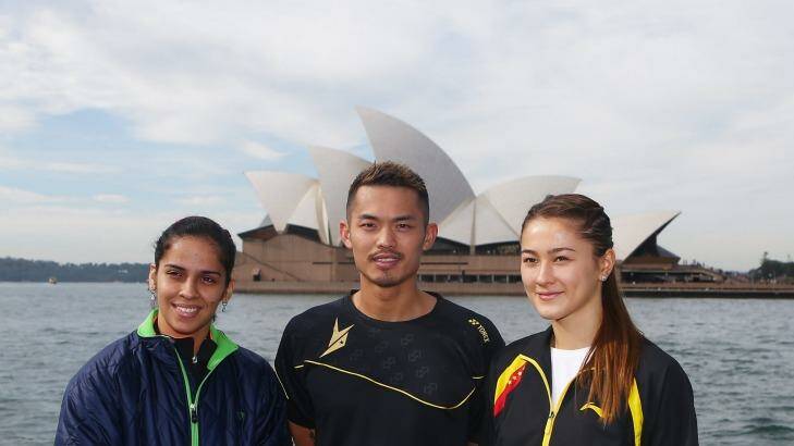 Saina Nehwal of India, Lin Dan of China and Gronya Somerville of Australia pose  in front of the Sydney Opera House ahead of the Australian Badminton Open on May 25, 2015.   Photo: Daniel Munoz / Fairfax Media