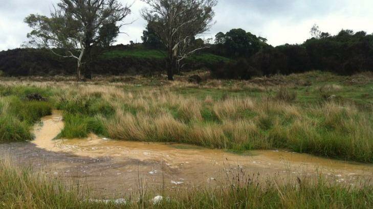 Silt running off farms in river making its way downstream to Moreton Bay. Photo: Supplied