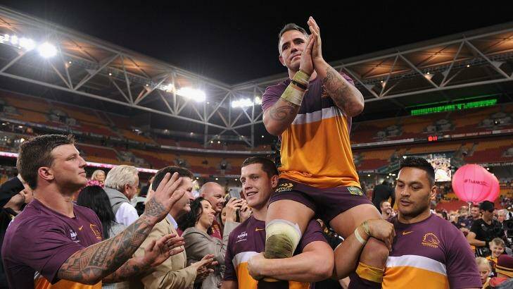 Broncos skipper Corey Parker carried off by his teammates after the end of the competition games, before the 2016 finals season began. Photo: Matt Roberts