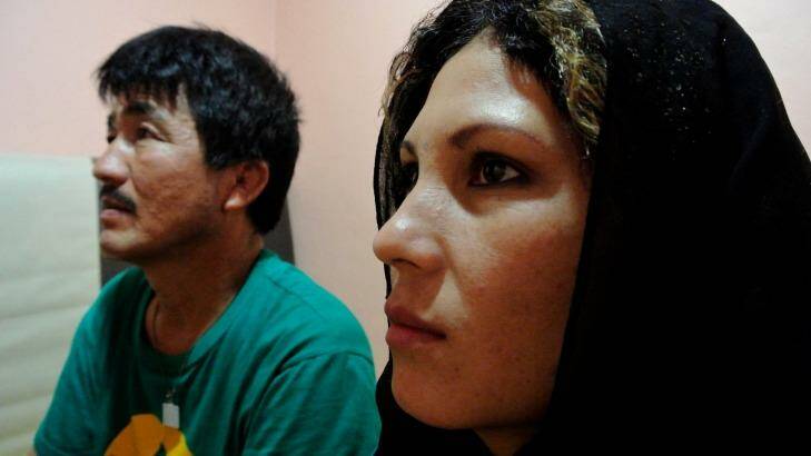 Mohammad Zaher Zafari and Shahista Dowoodi in the room they have rented after arriving in Jakarta to seek asylum. Photo: Michael Bachelard