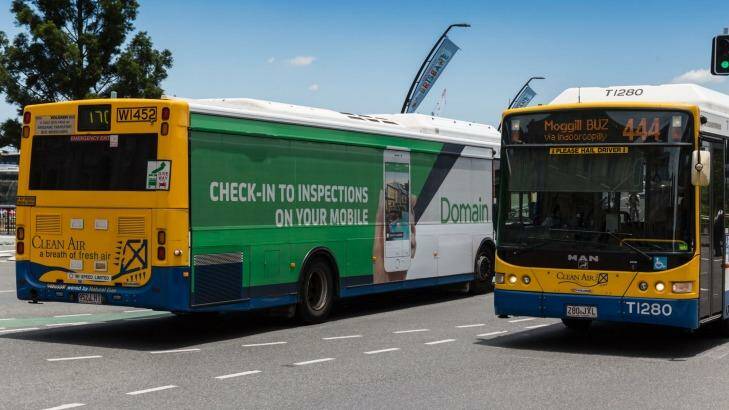 Give way signs are plastered on the back of Brisbane's buses.  Photo: Glenn Hunt