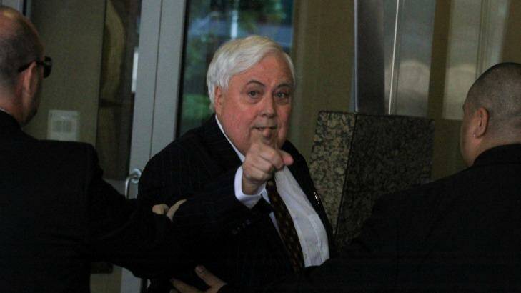 Clive Palmer clashed with media ahead of his appearance in Brisbane's Federal Court on Monday. Photo: Jorge Branco