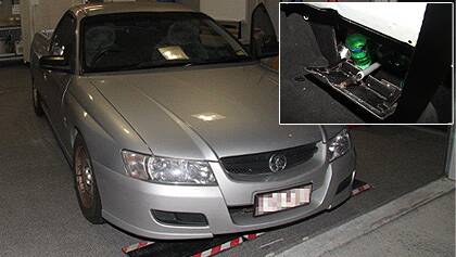 Police found a steel safe hidden behind the front passenger seat of this seized Holden ute.