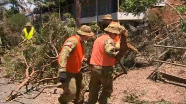Australian Defence Force personnel help clean-up in Yeppoon after Cyclone Marcia. Photo: Nine News