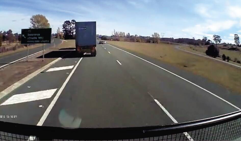 A screenshot of a video showing unsafe overtaking on the Bass Highway.