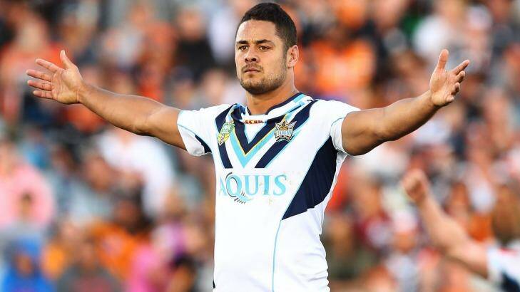 Jarryd Hayne celebrates the field goal he kicked to deliver victory to the Titans over the Tigers in the dying seconds of Saturday's clash at Campbelltown Sports Stadium.