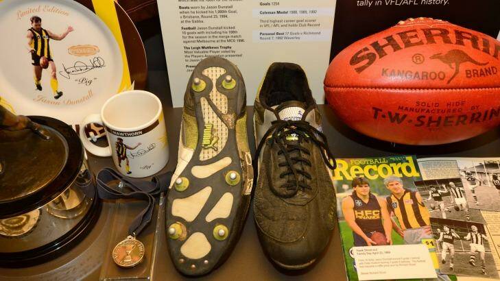 The boots Jason Dunstall wore when he kicked his 1000th goal. Photo: Justin McManus