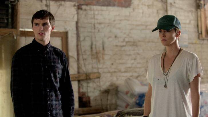 Nicholas Hoult, left, as Lyle Wirth and Charlize Theron as Libby Day in a scene from "Dark Places." Credit: Doane Gregory Photo: Doane Gregory