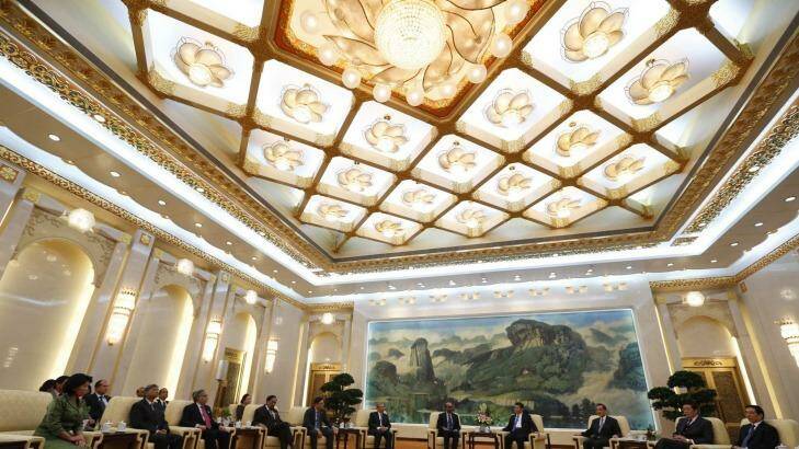 China's President Xi Jinping (fourth right) meets guests at the Asian Infrastructure Investment Bank (AIIB) launch ceremony in the Great Hall of the People in Beijing in October last year. Photo: POOL
